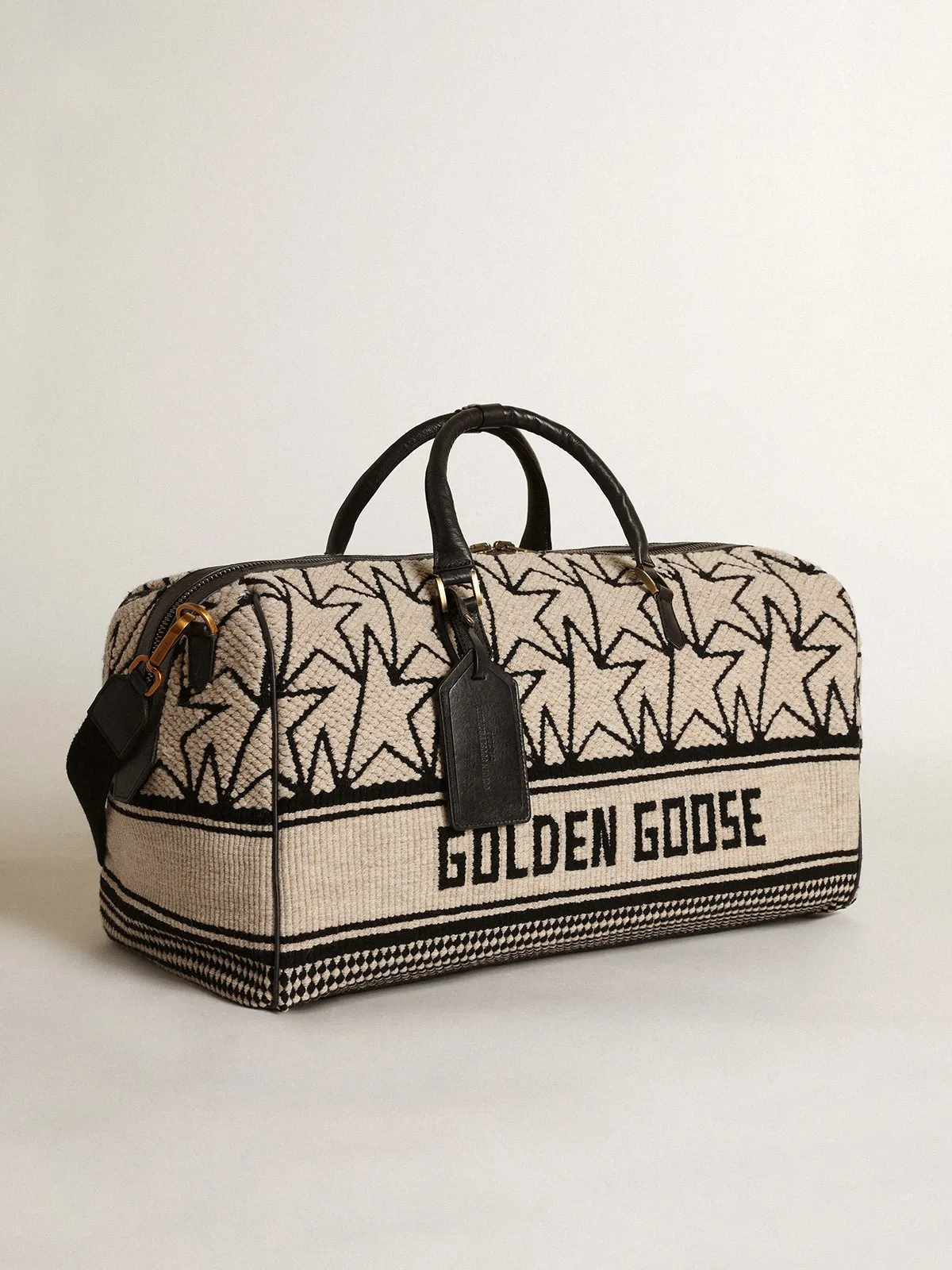 Men's duffle bag in milk-white jacquard wool and black lettering